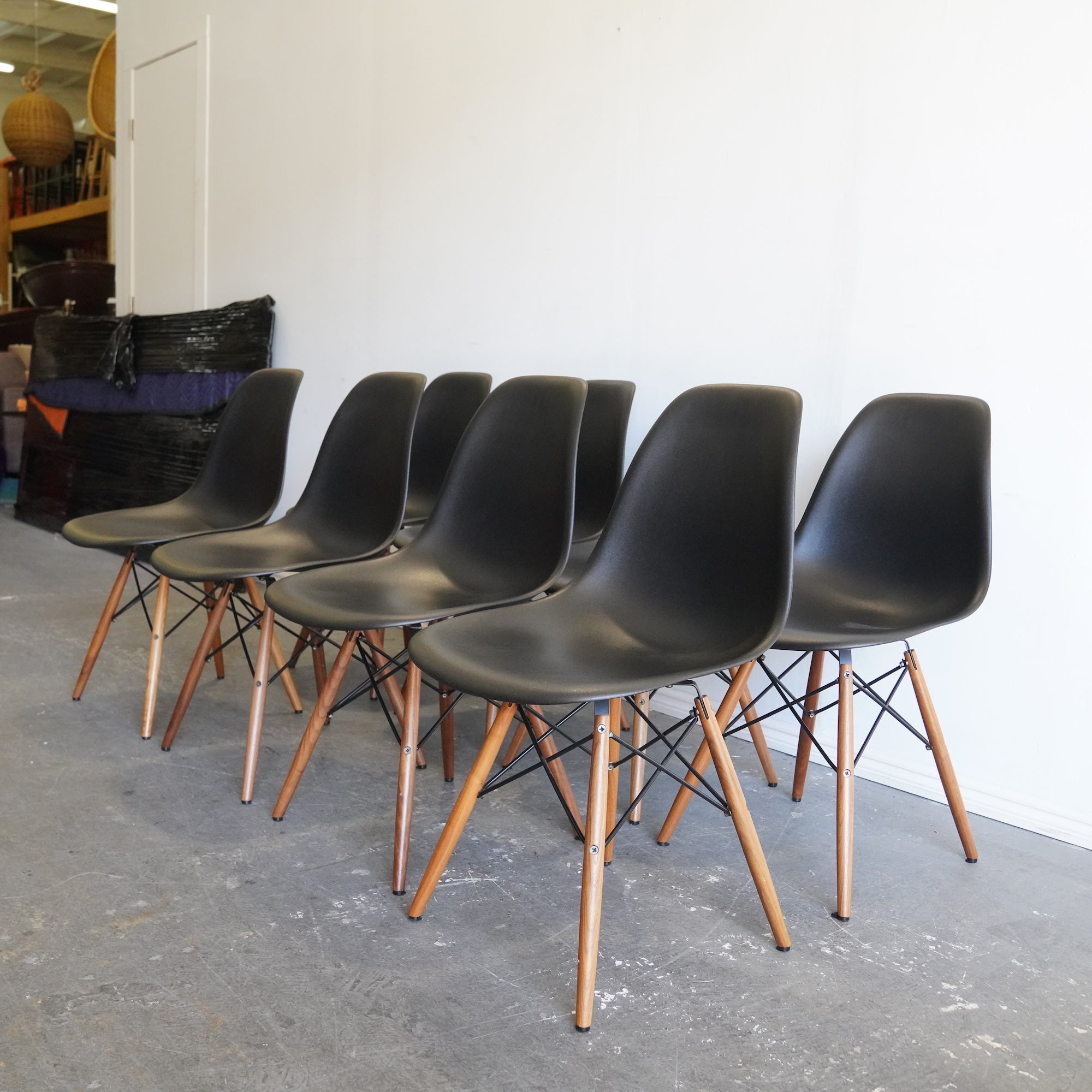 Authentic Herman Miller set of 8 Eames plastic molded chairs