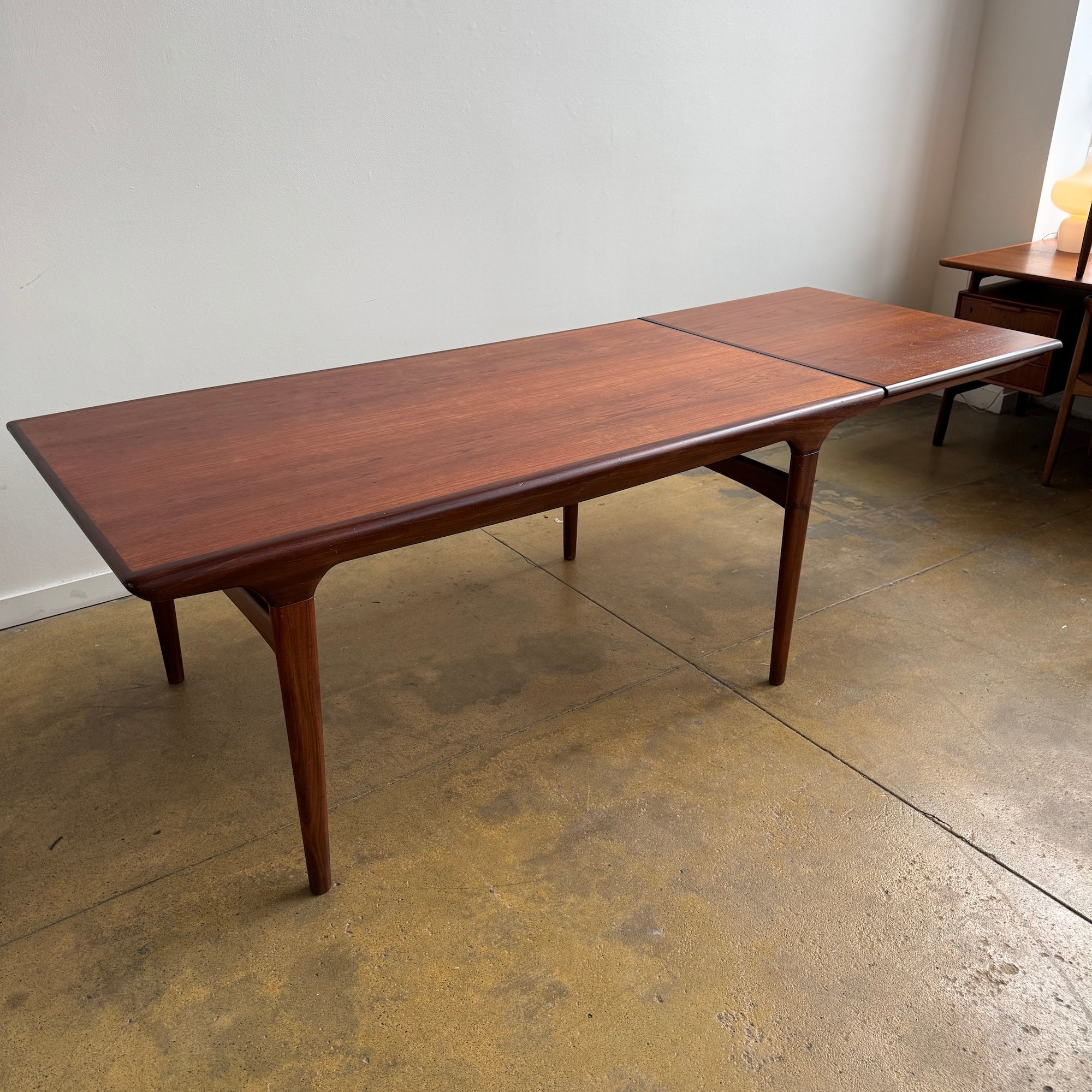 Danish Modern Expandable Dining Table by Johannes Andersen for Uldum Møbelfabrik