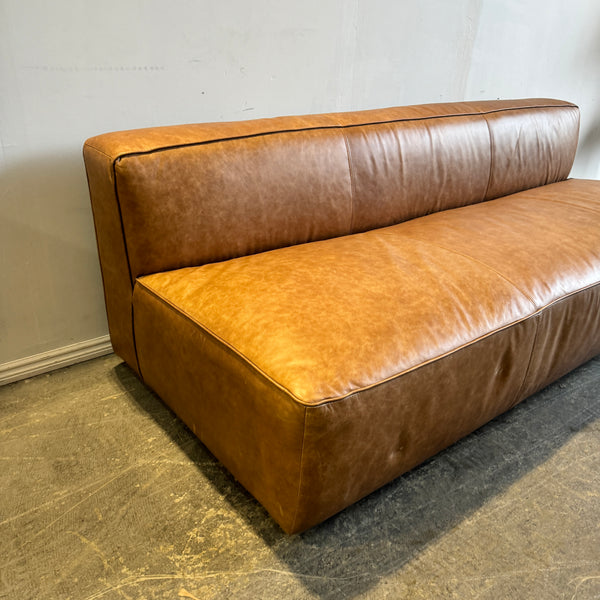 CB2 Lenyx Saddle Leather Armless Sofa