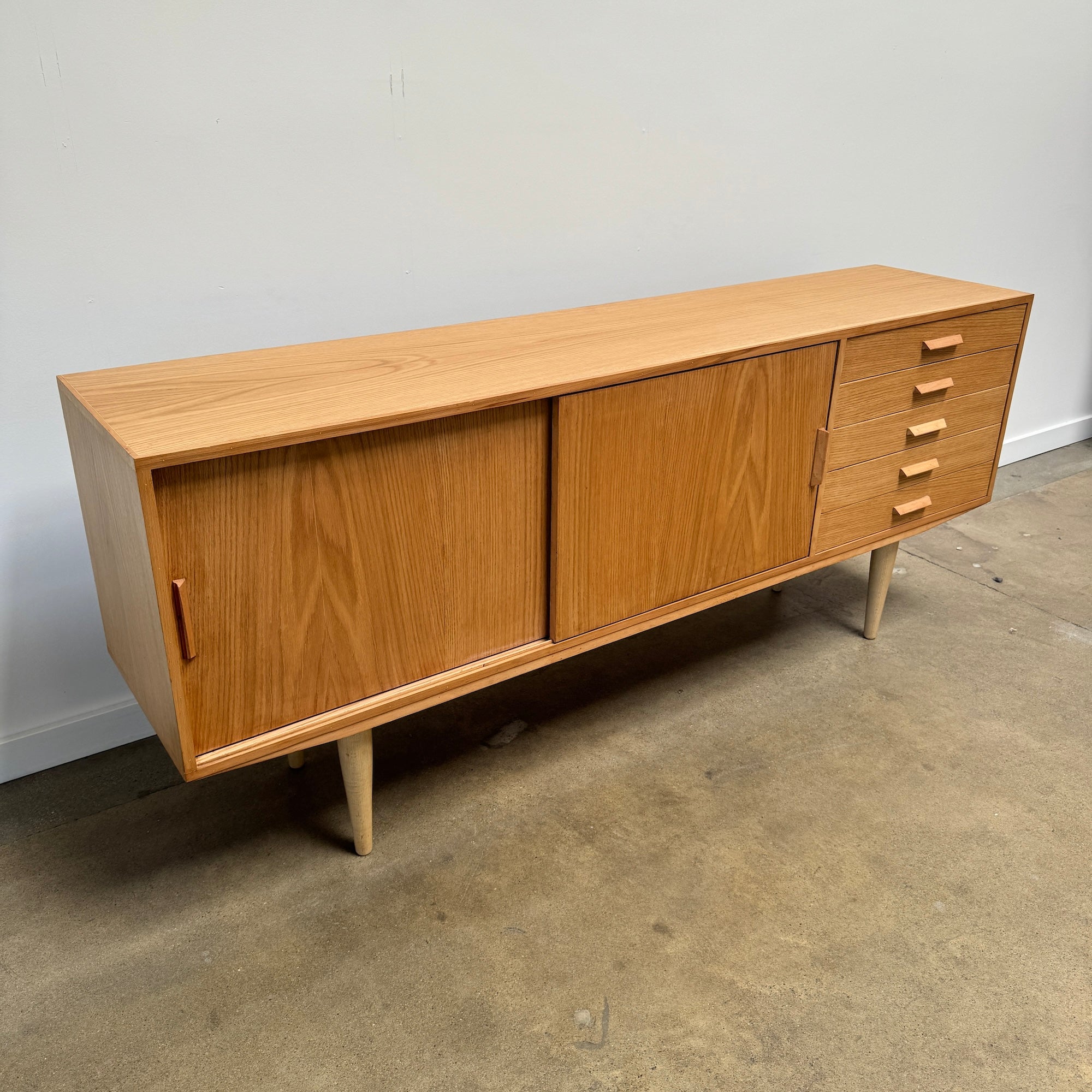 Danish Modern Oakwood Sideboard with 5 drawers and sliding doors