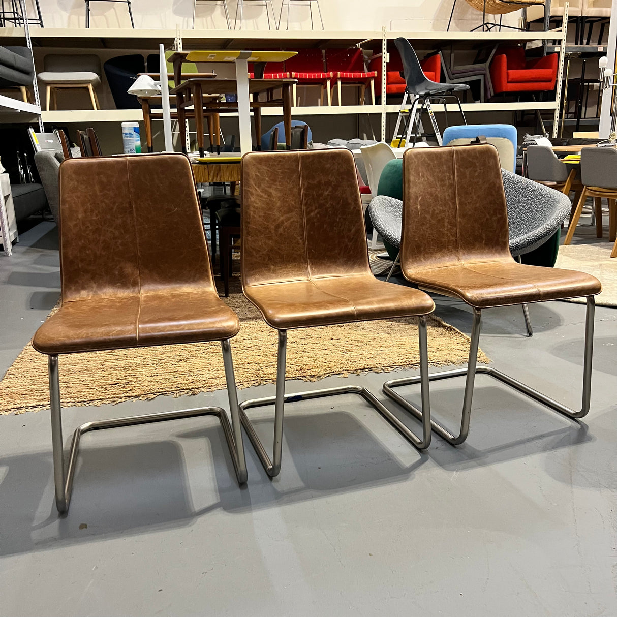 CB2 Set of 3 Pony Leather dining chairs
