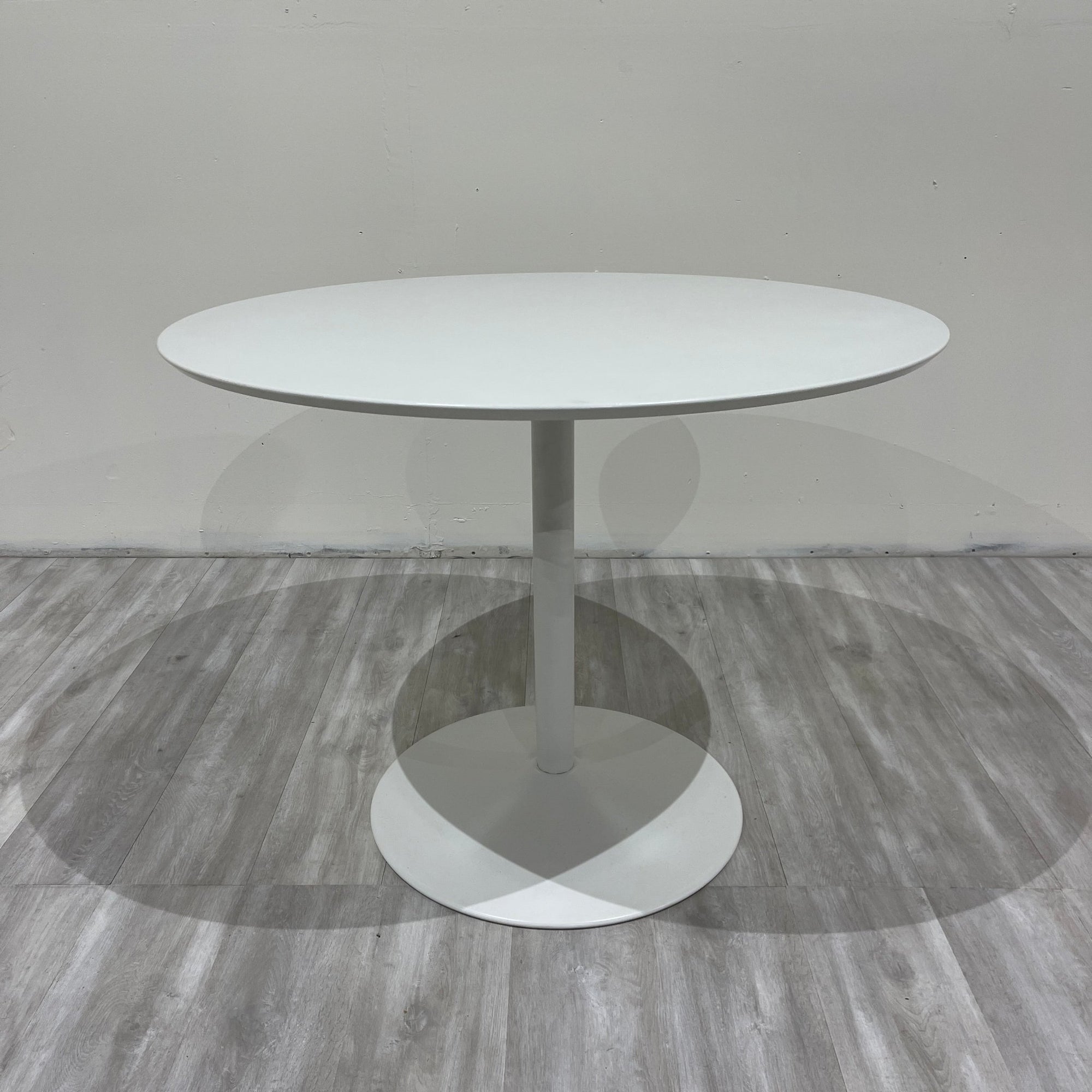 CB2 White circular dining Table - enliven mart