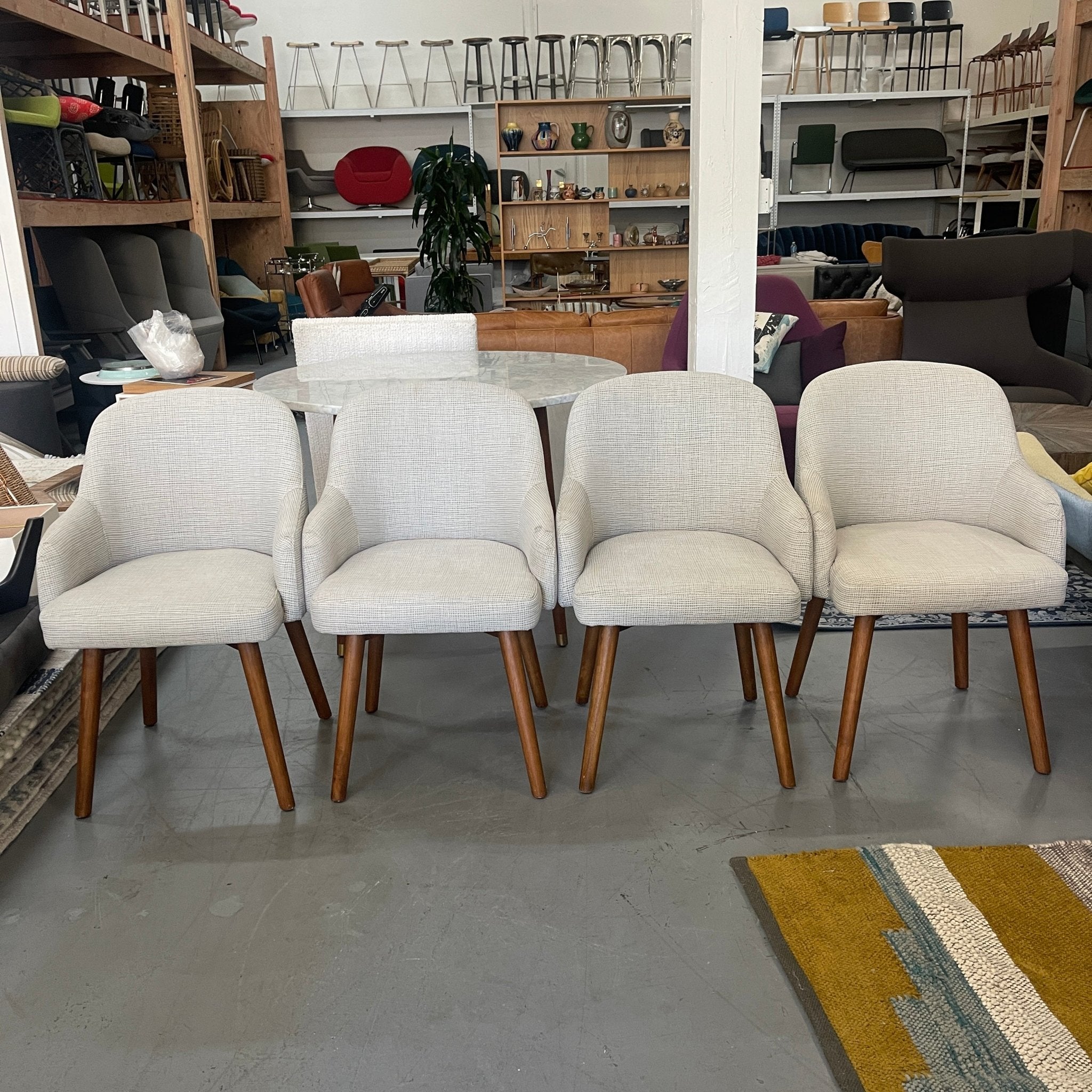 West Elm Saddle dining chairs enliven mart